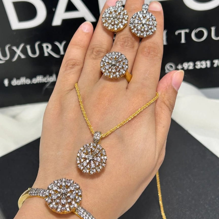 Gold jewelry set with earrings, necklace, and bracelet on a hand, Dafa brand visible in the background.